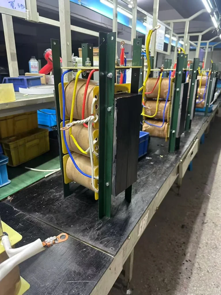 Wilmall transformer core stacking, control transformer fabrication