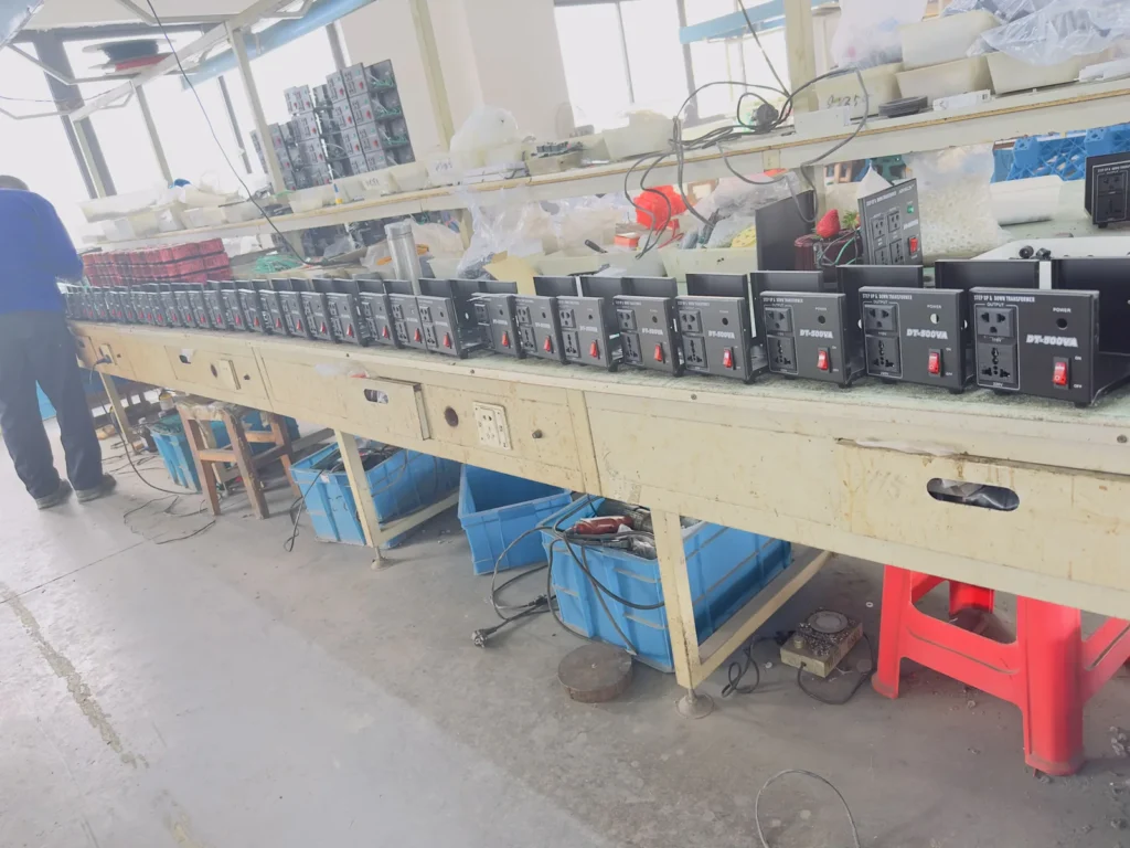 Wilmall craftsman working, toroidal winding process