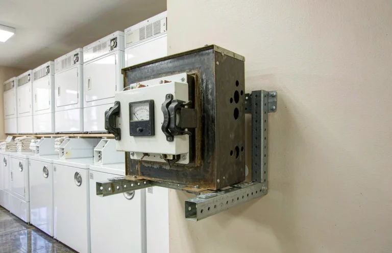 Step down transformer installed in a laundromat with commercial washing machines