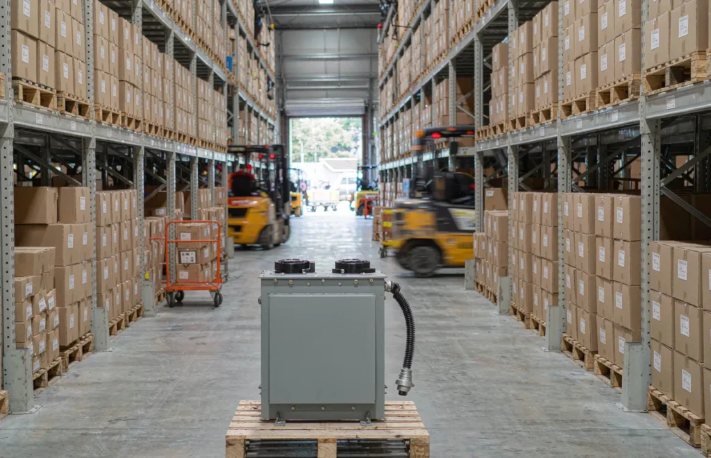 Step down transformer on a pallet in a distribution warehouse for a transformer distributor